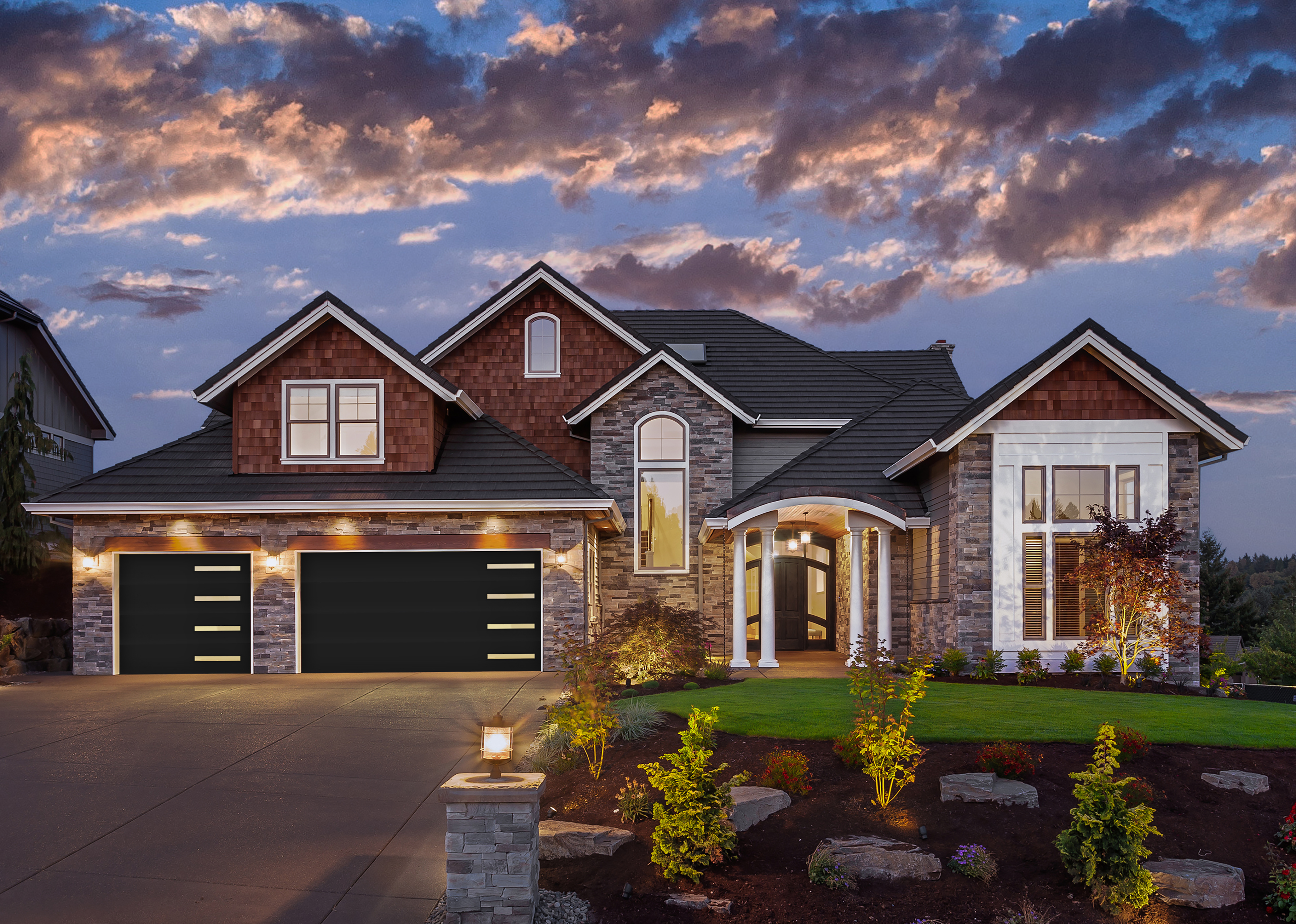 Flush panel black garage door installed by Go Nuts Garage Door in Granbury, TX